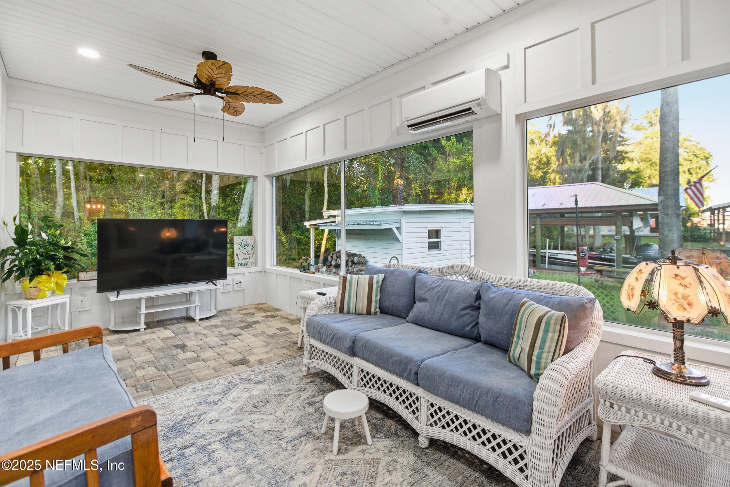 128 Santa Rosa Street Florahome, FL 32140 - Photo 37 of 57 Back Enclosed Porch 1.1