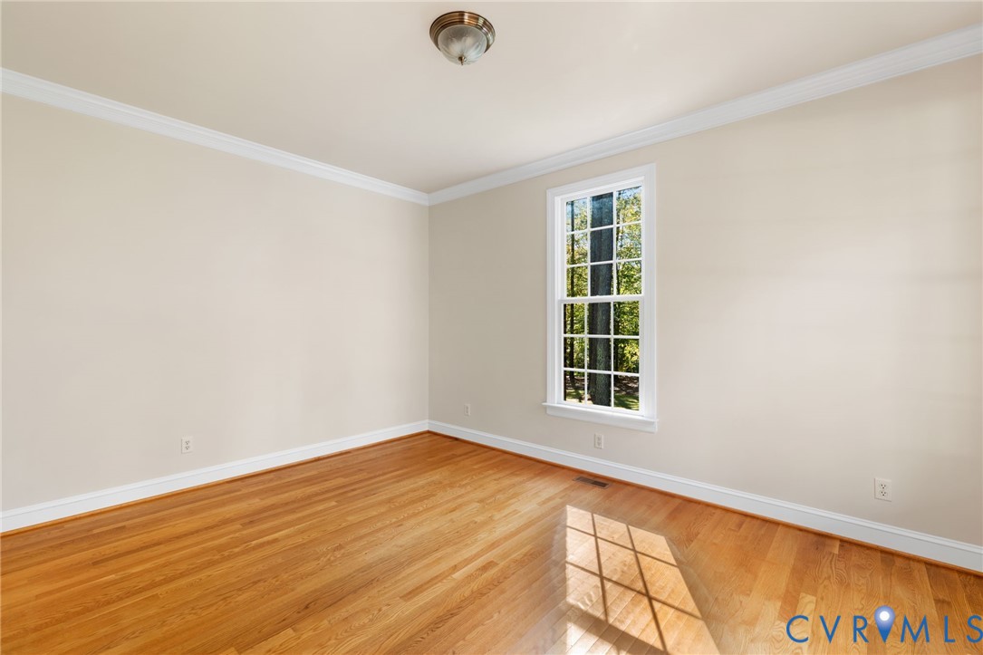 104 Petersburg Road Powhatan, VA 23139 - Photo 5 of 45 an empty room with a window