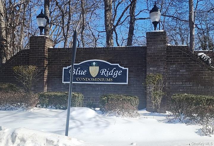 36 Blue Ridge Drive Medford, NY 11763 - Photo 3 of 3 a sign on the side of a building
