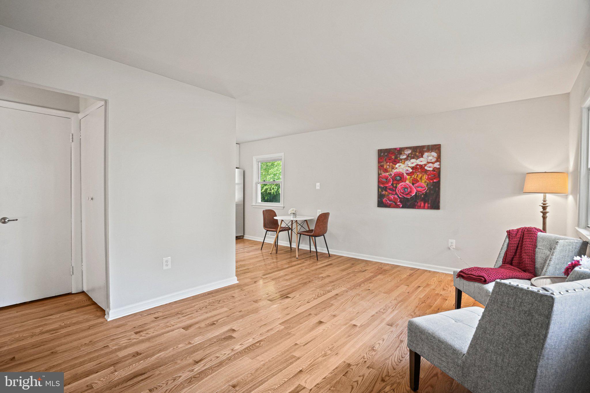 616 Ritchie Avenue Silver Spring, MD 20910 - Photo 4 of 37 a living room with furniture and a wooden floor