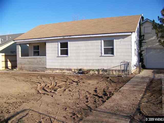 1956 Citron Street Reno, NV 89512 - Photo 1 of 9 a front view of a house with a yard