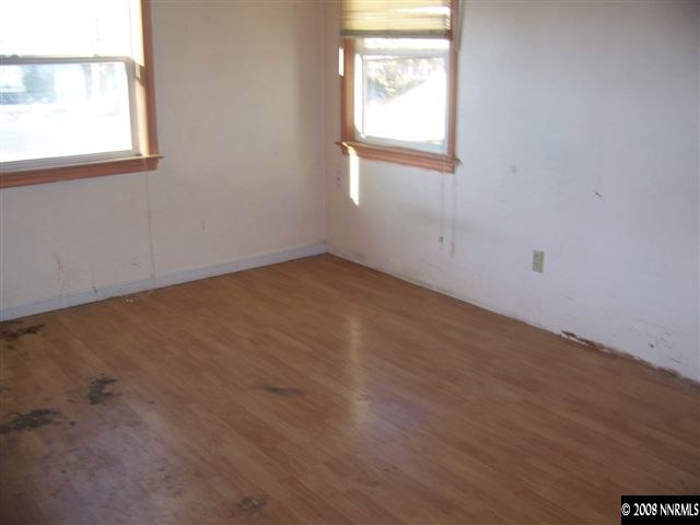 1956 Citron Street Reno, NV 89512 - Photo 2 of 9 an empty room with a window