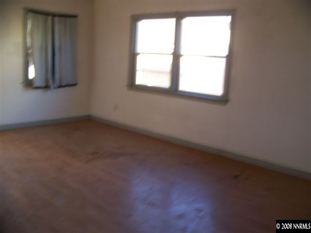 1956 Citron Street Reno, NV 89512 - Photo 3 of 9 an empty room with a window