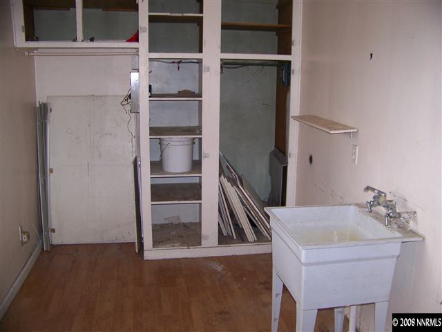 1956 Citron Street Reno, NV 89512 - Photo 8 of 9 a kitchen with a refrigerator and cabinets