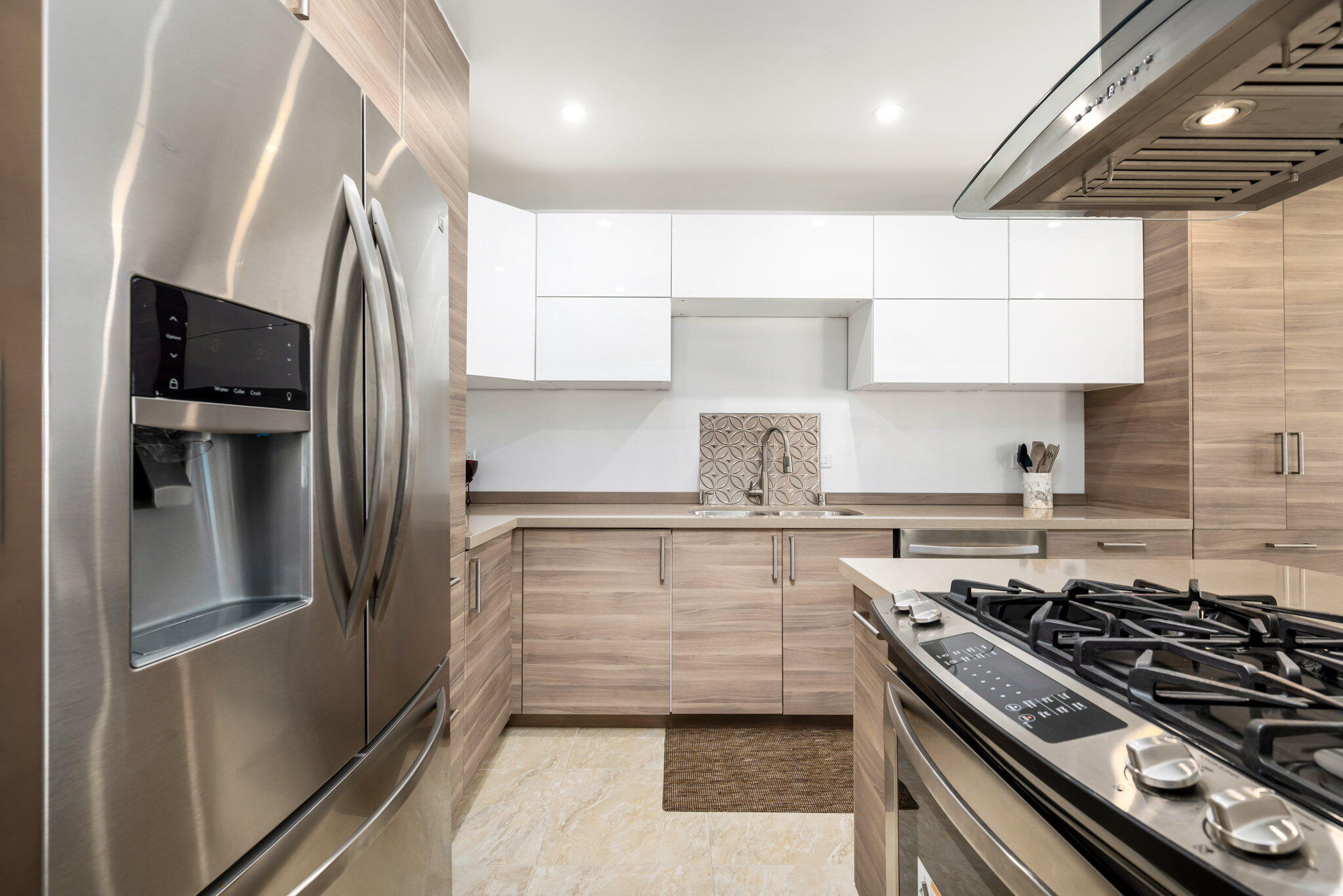349 West Mariscal Road Palm Springs, CA 92262 - Photo 23 of 34 a kitchen with stainless steel appliances a sink stove and refrigerator