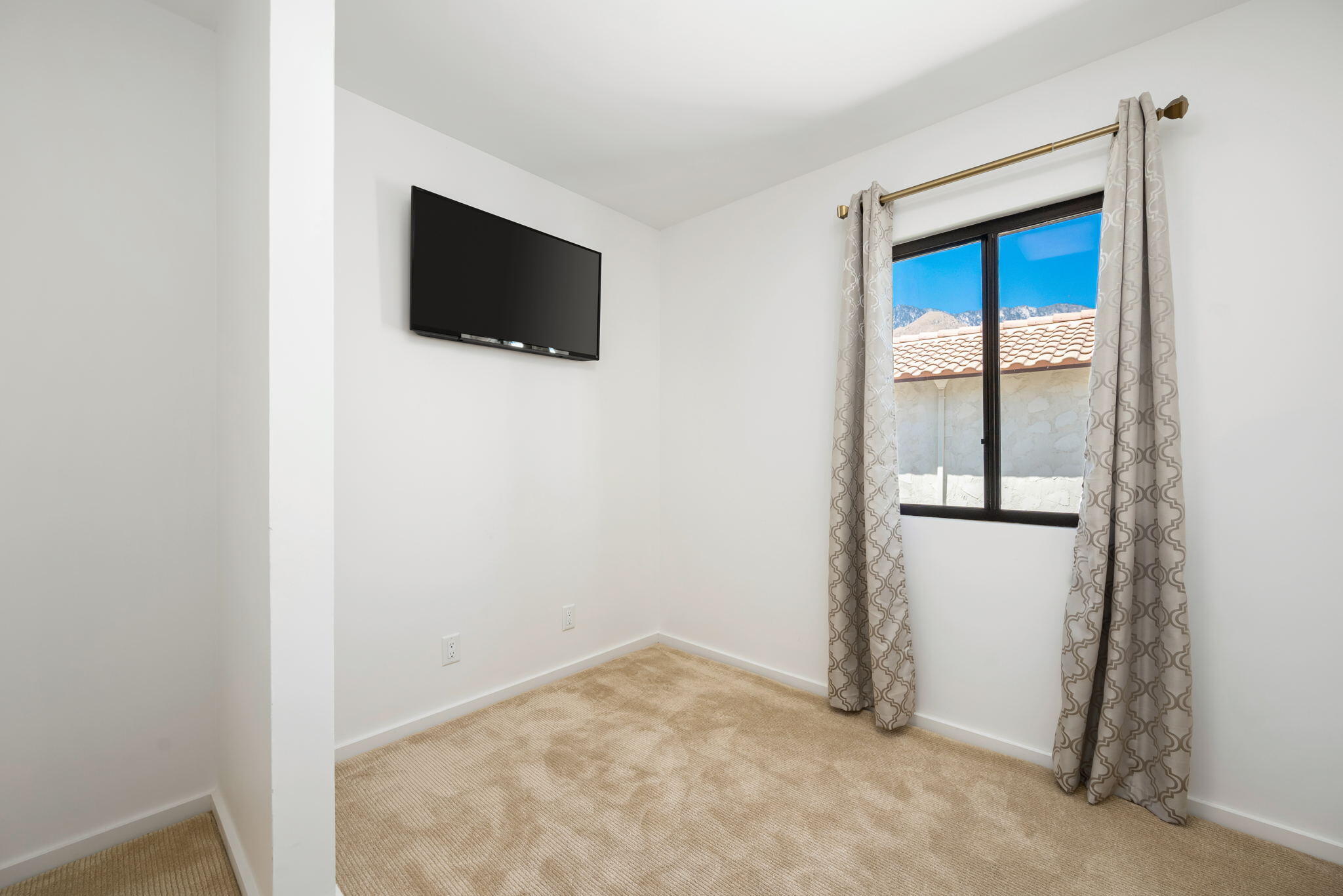 349 West Mariscal Road Palm Springs, CA 92262 - Photo 28 of 34 a view of a livingroom with an empty space and a window