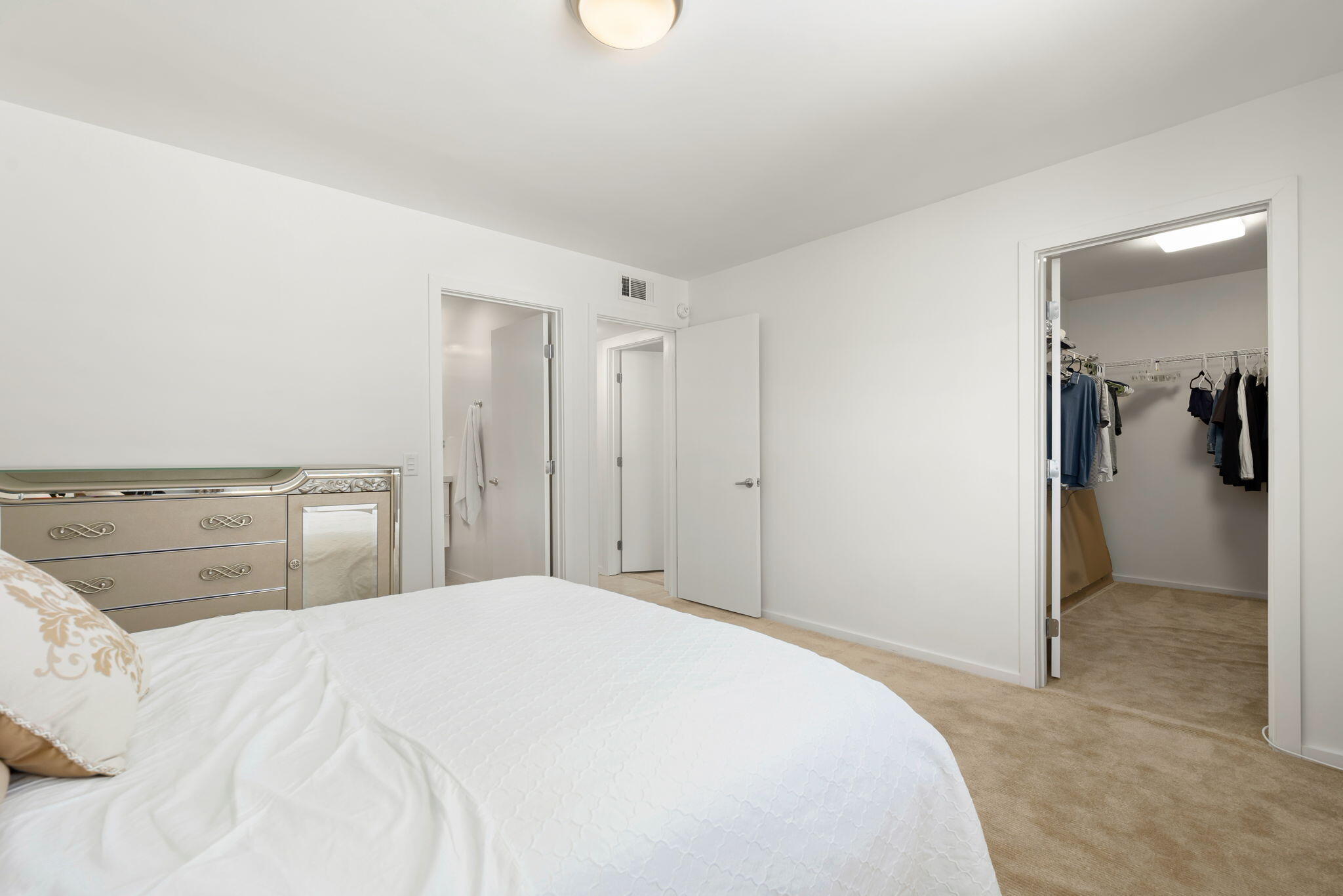 349 West Mariscal Road Palm Springs, CA 92262 - Photo 30 of 34 a bedroom with a bed and a chandelier