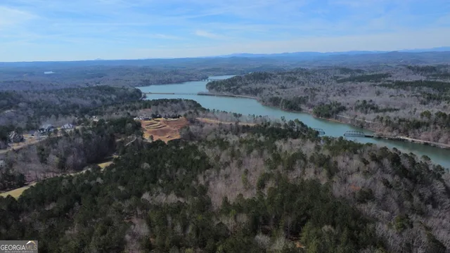 a view of a dry field with lots of bushes
