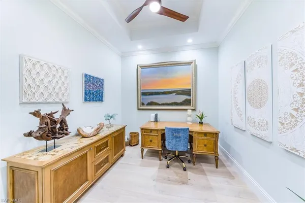 a room with furniture a rug and a window