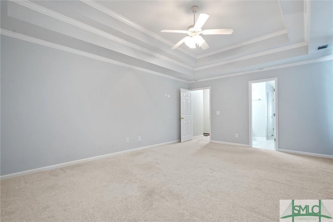 141 Mill Court Rincon, GA 31326 - Photo 15 of 41 Multi tiered ceiling and great windows.