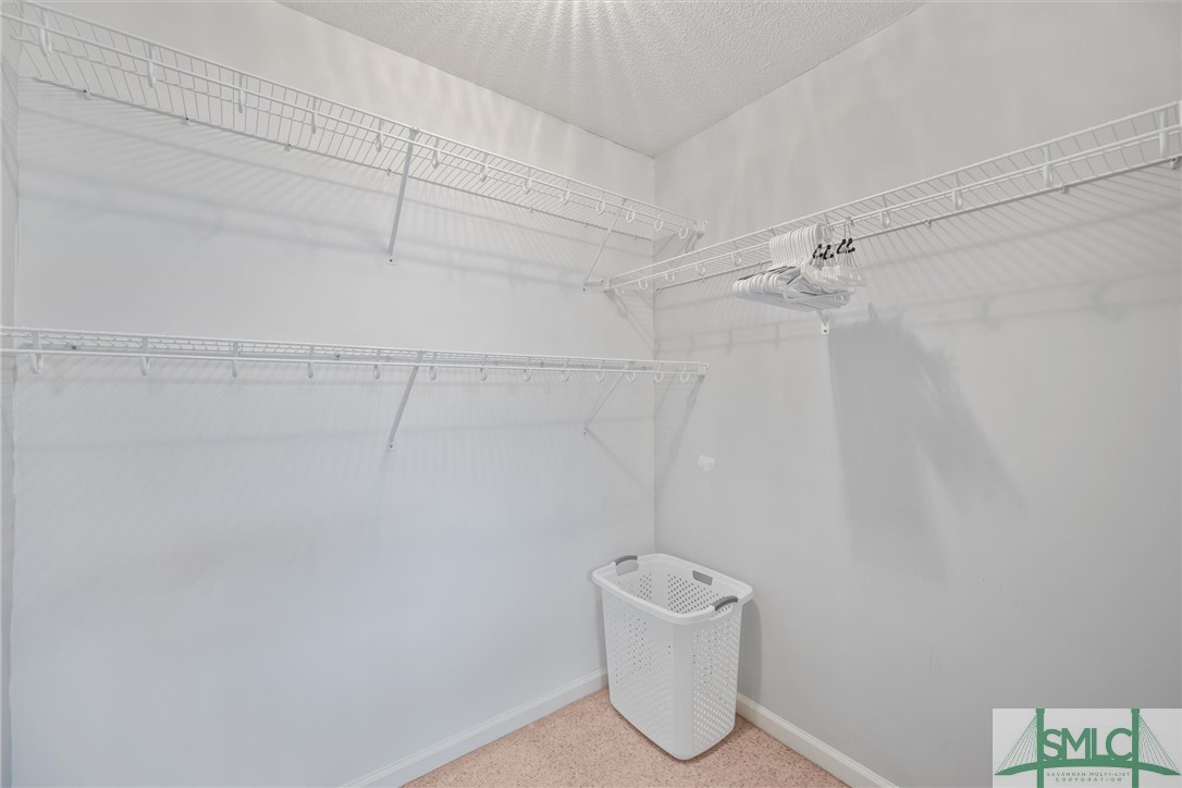 141 Mill Court Rincon, GA 31326 - Photo 20 of 41 Walk in closet with built in shelving.