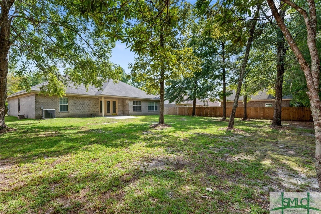 141 Mill Court Rincon, GA 31326 - Photo 27 of 41 Outside is a wonderful backyard.