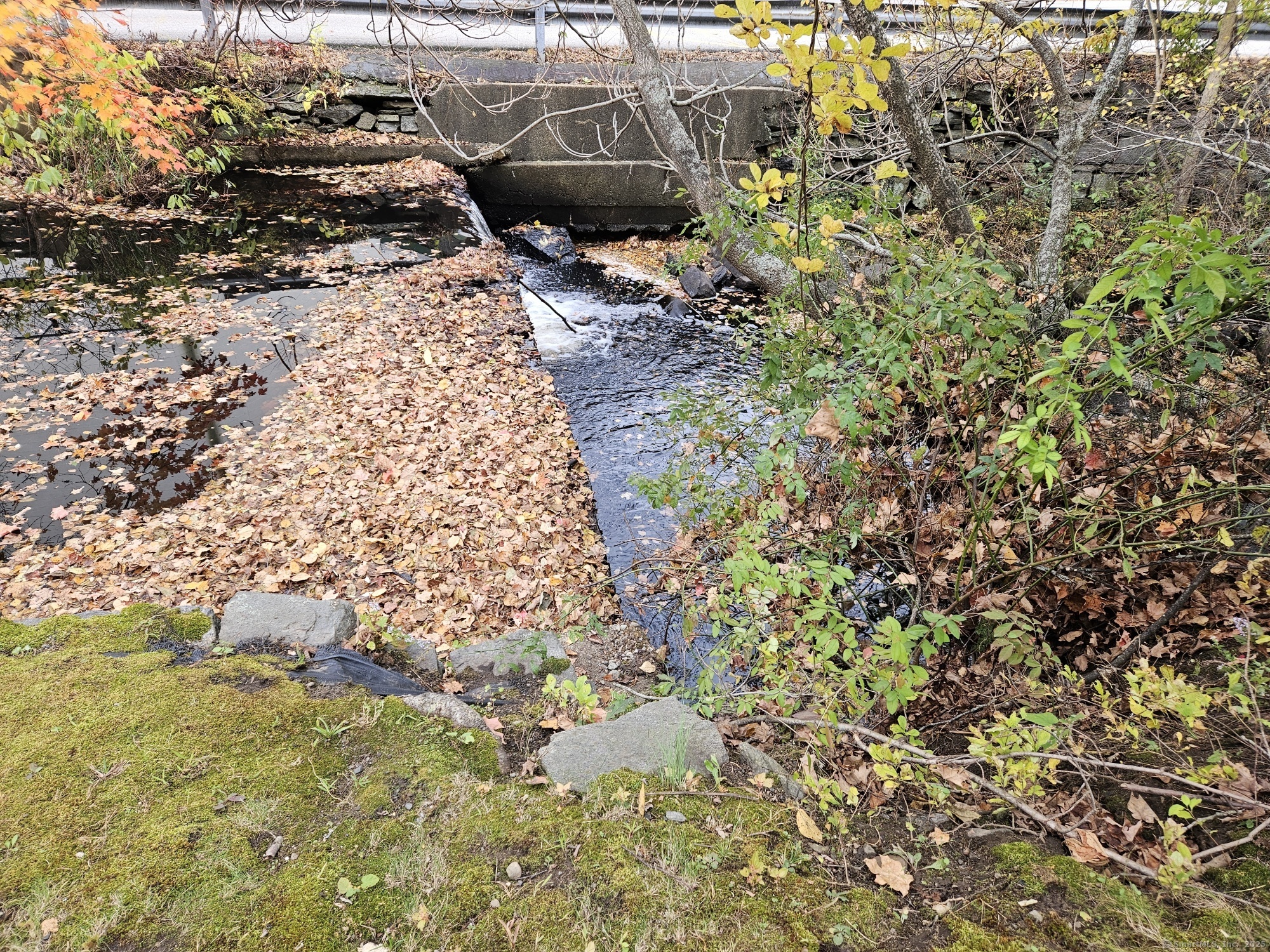 92 Main Street, Unit 101 Deep River, CT 06417 - Photo 14 of 16 a view of an outdoor space with a lake view