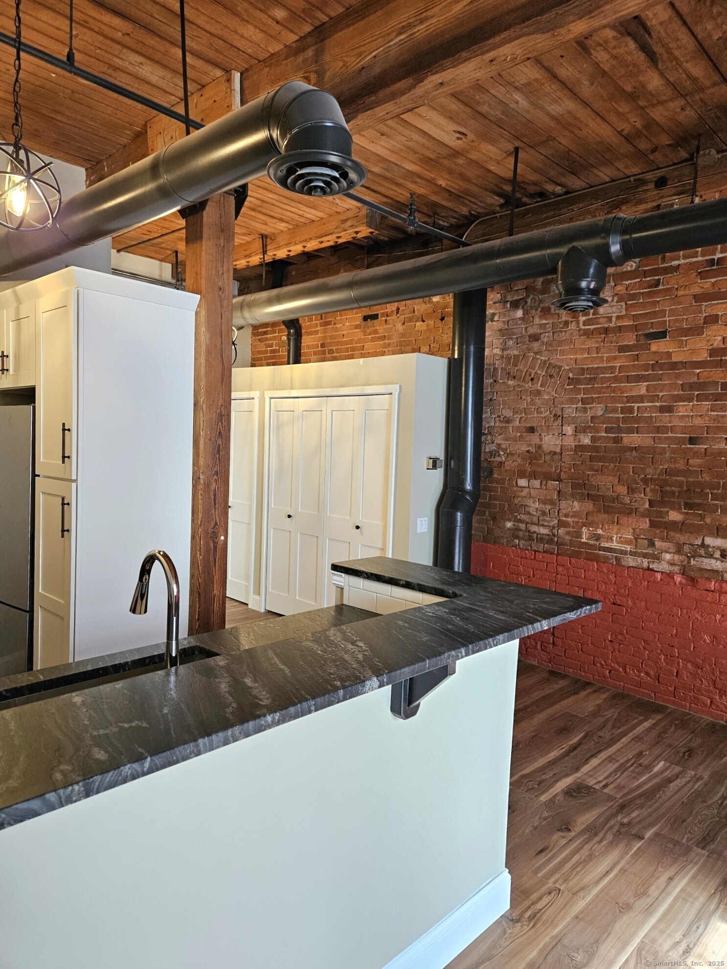 92 Main Street, Unit 101 Deep River, CT 06417 - Photo 9 of 16 a view of a backyard