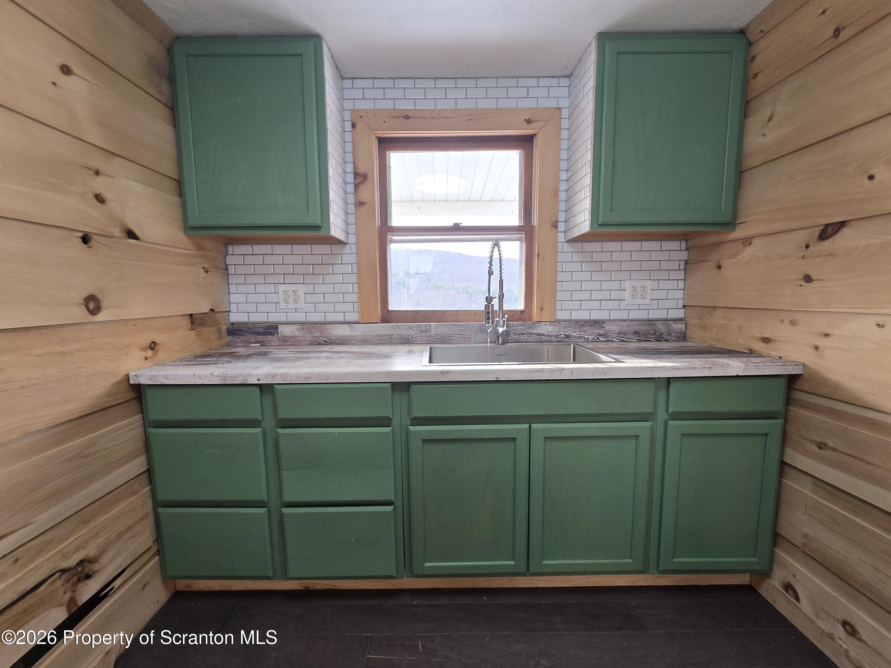 483 Turnpike Street Susquehanna, PA 18847 - Photo 15 of 27 a kitchen with a sink and a window