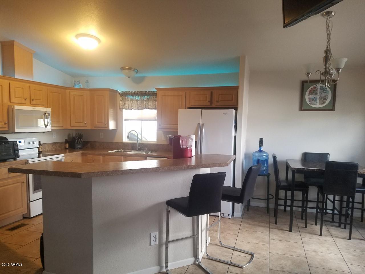 3355 South Cortez Road, Unit 13 Apache Junction, AZ 85119 - Photo 9 of 15 Richie kitchen dining