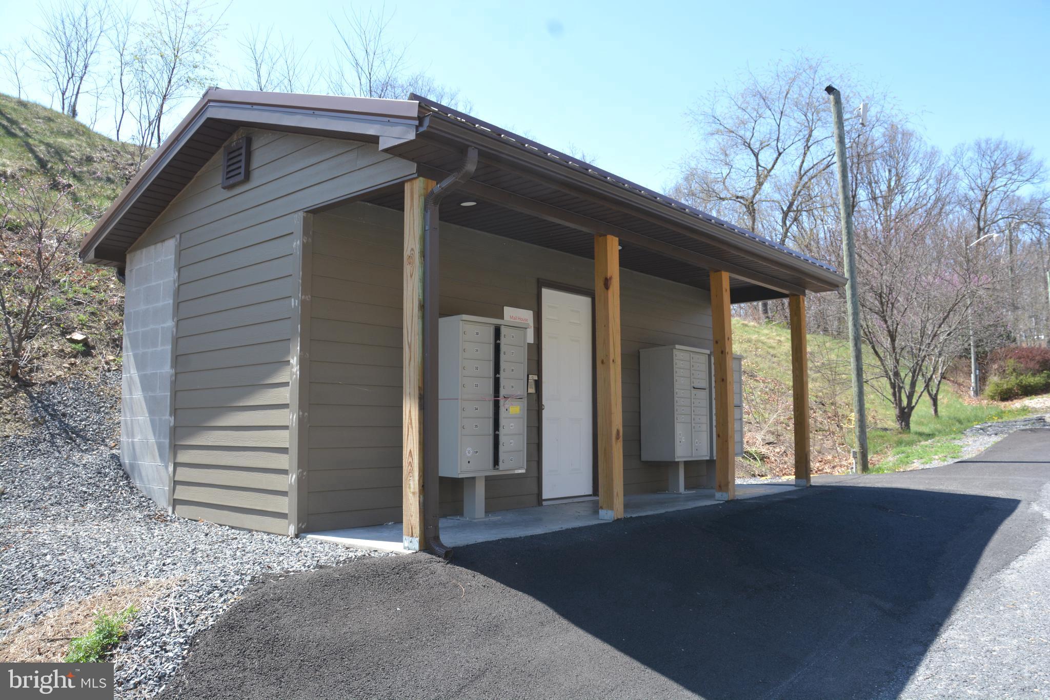 400 Locust Ridge Moorefield, WV 26836 - Photo 85 of 87 a front view of a house with a yard
