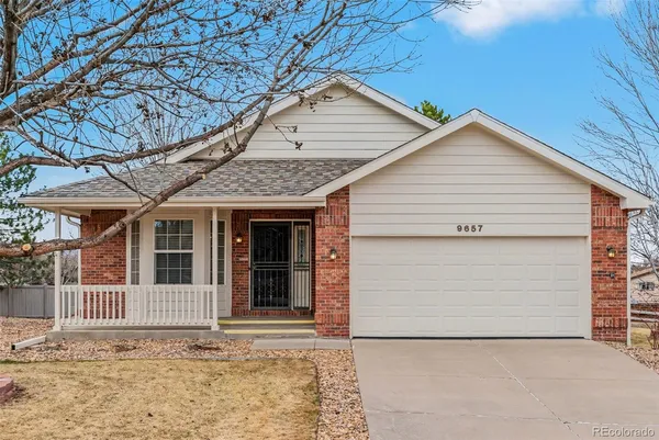 a view of a house with a garage