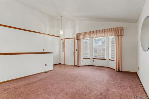 a view of an empty room with window