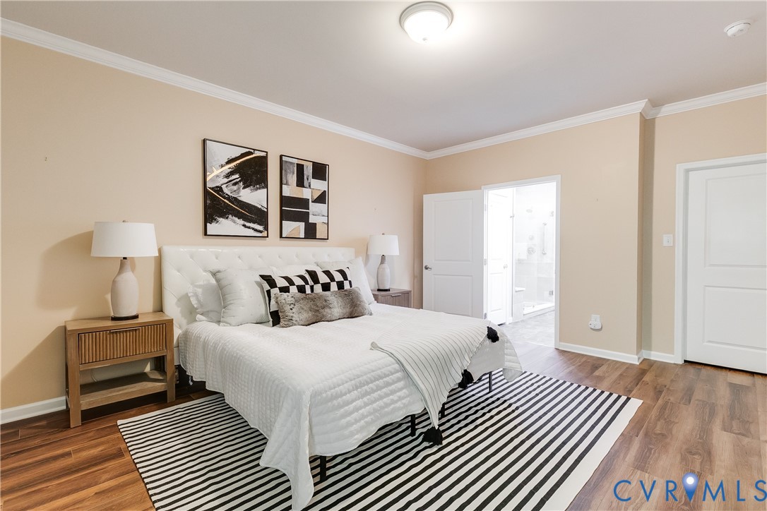 7538 South Franklins Way Quinton, VA 23141 - Photo 24 of 48 a bedroom with a large bed and a window