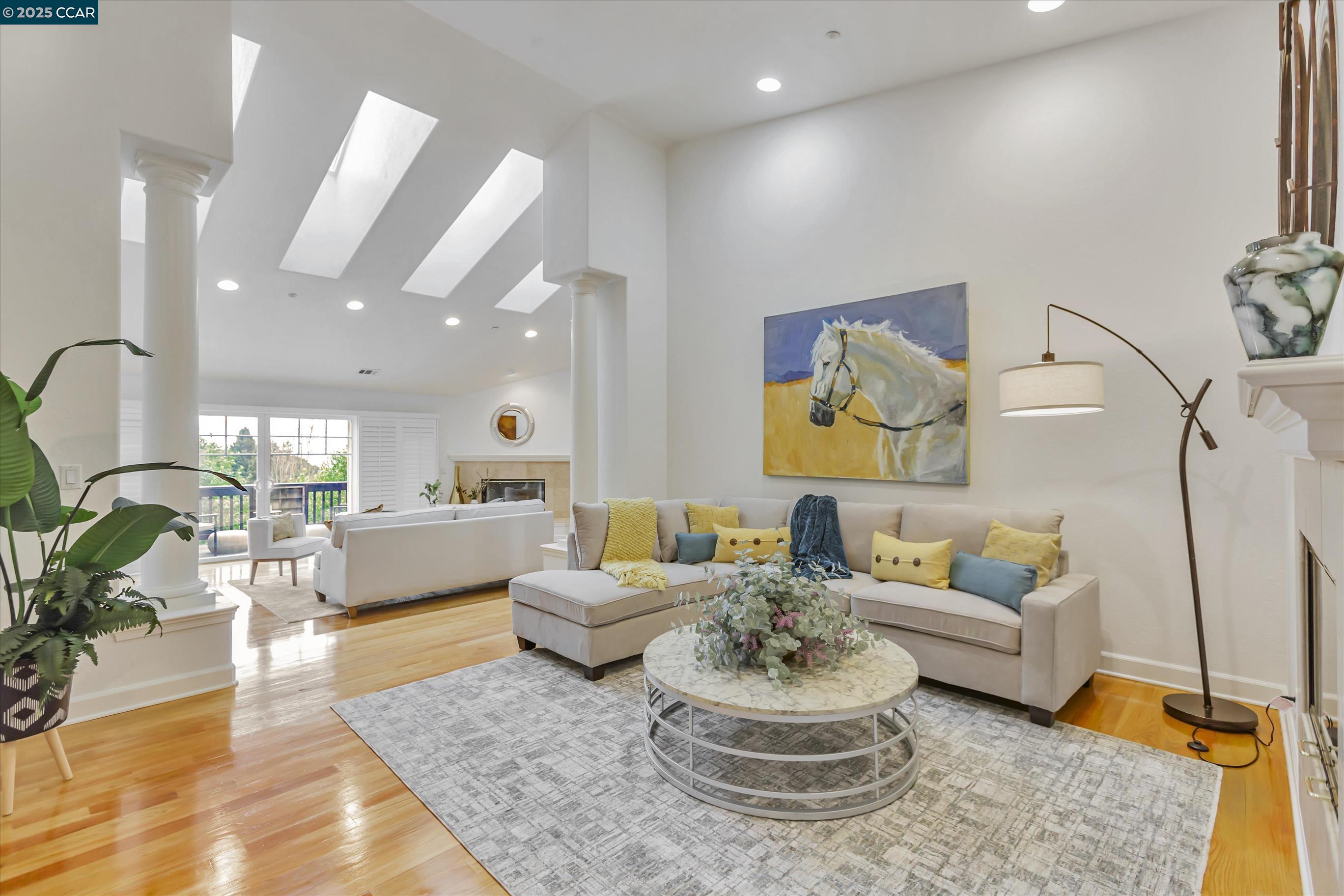1215 Alvarado Road Berkeley, CA 94705 - Photo 11 of 52 a living room with furniture and a rug