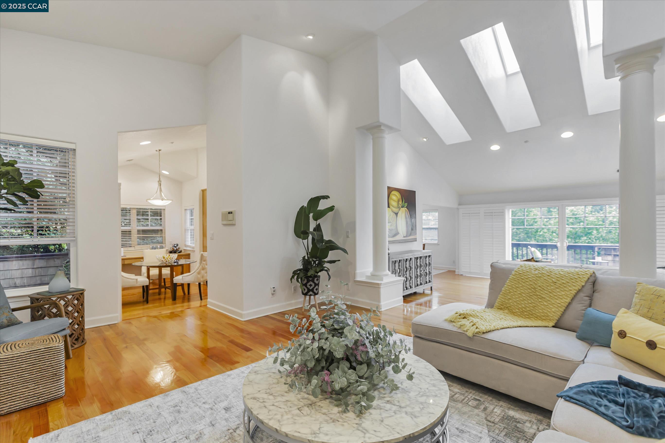 1215 Alvarado Road Berkeley, CA 94705 - Photo 12 of 52 a living room with furniture and a large window
