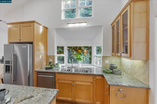 a kitchen with a stove and a sink