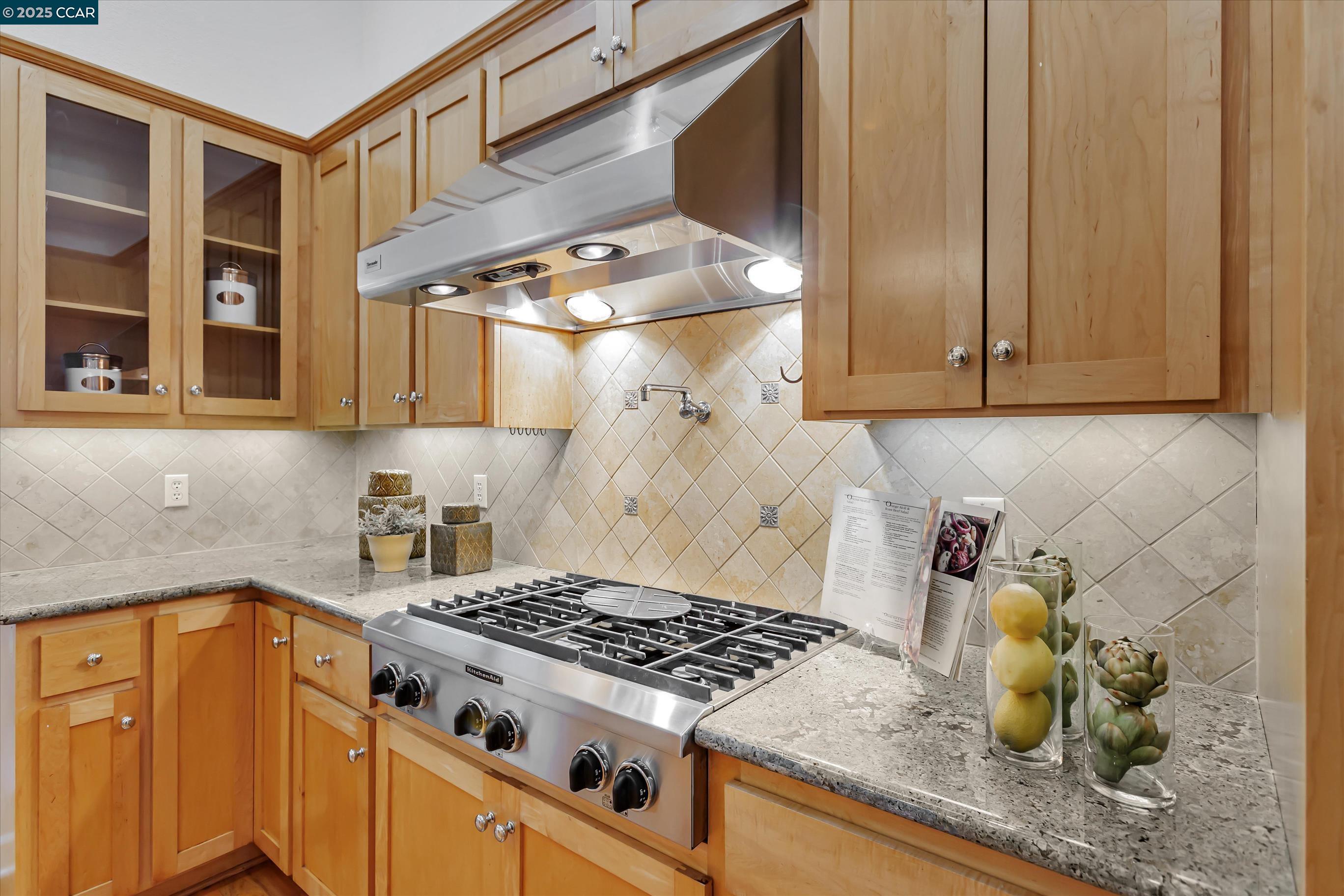 1215 Alvarado Road Berkeley, CA 94705 - Photo 16 of 52 a kitchen with a stove and a sink