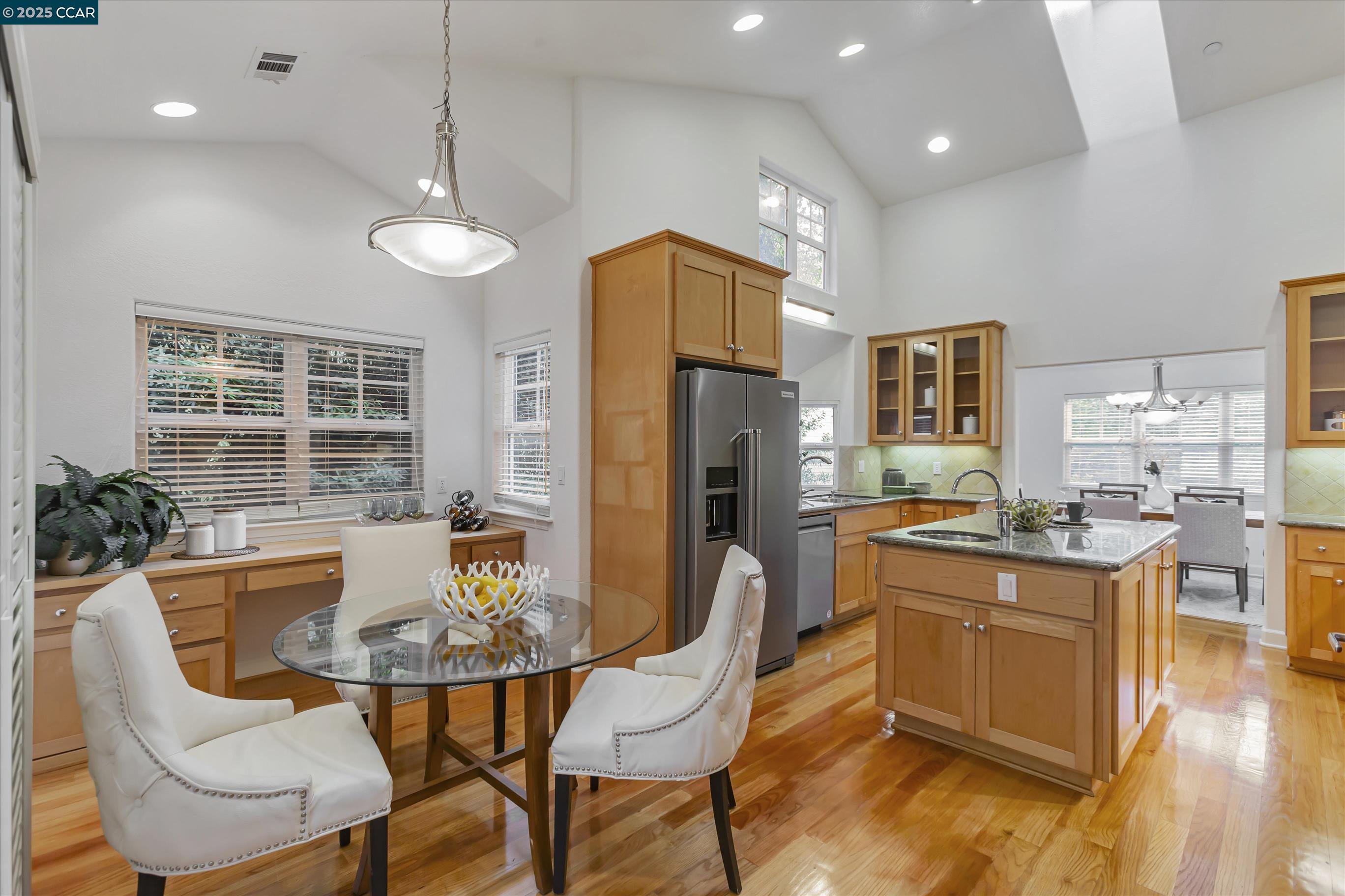 1215 Alvarado Road Berkeley, CA 94705 - Photo 17 of 52 a view of a dining room with furniture window and wooden floor