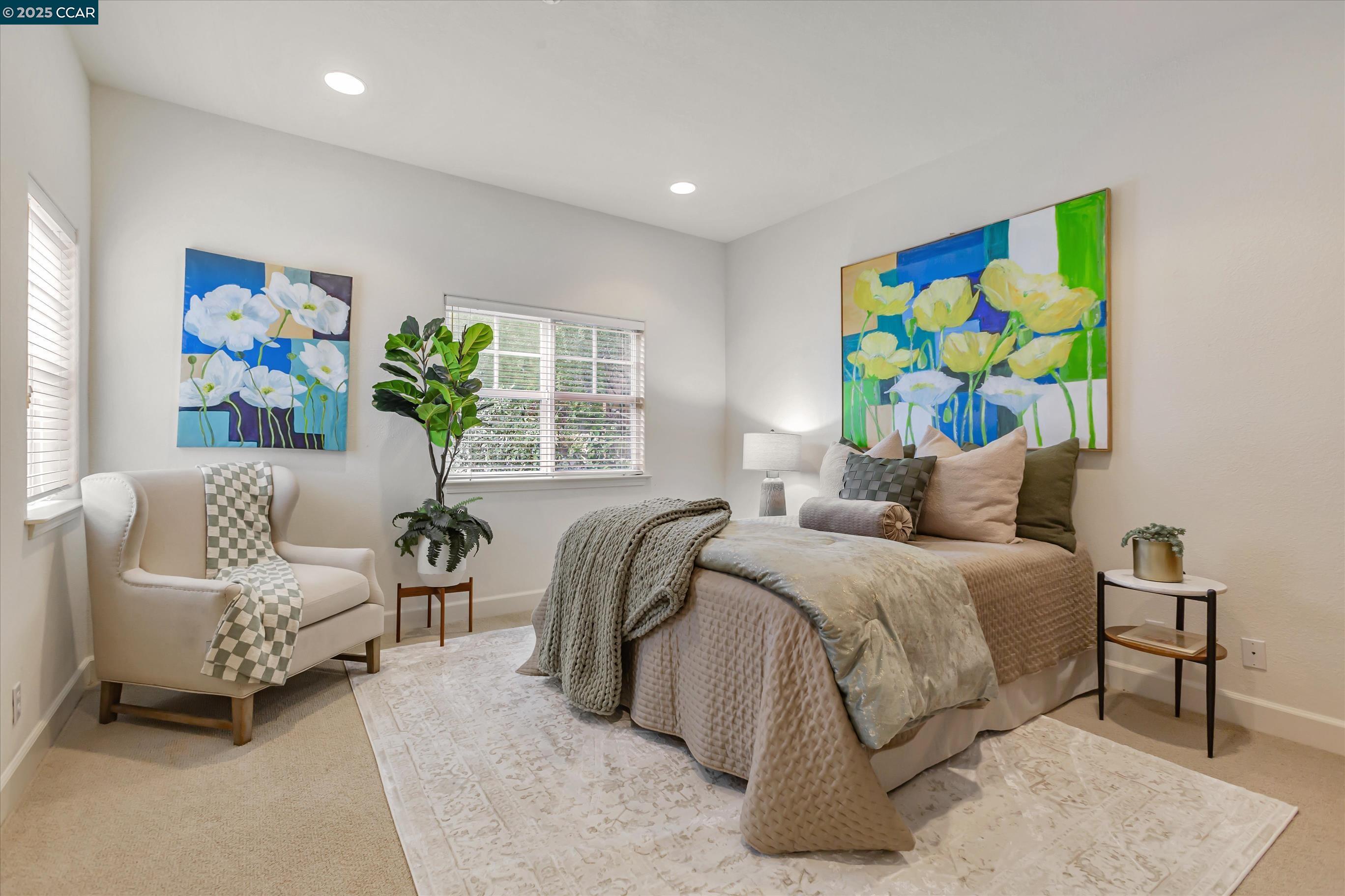 1215 Alvarado Road Berkeley, CA 94705 - Photo 22 of 52 a bedroom with a bed and a couch