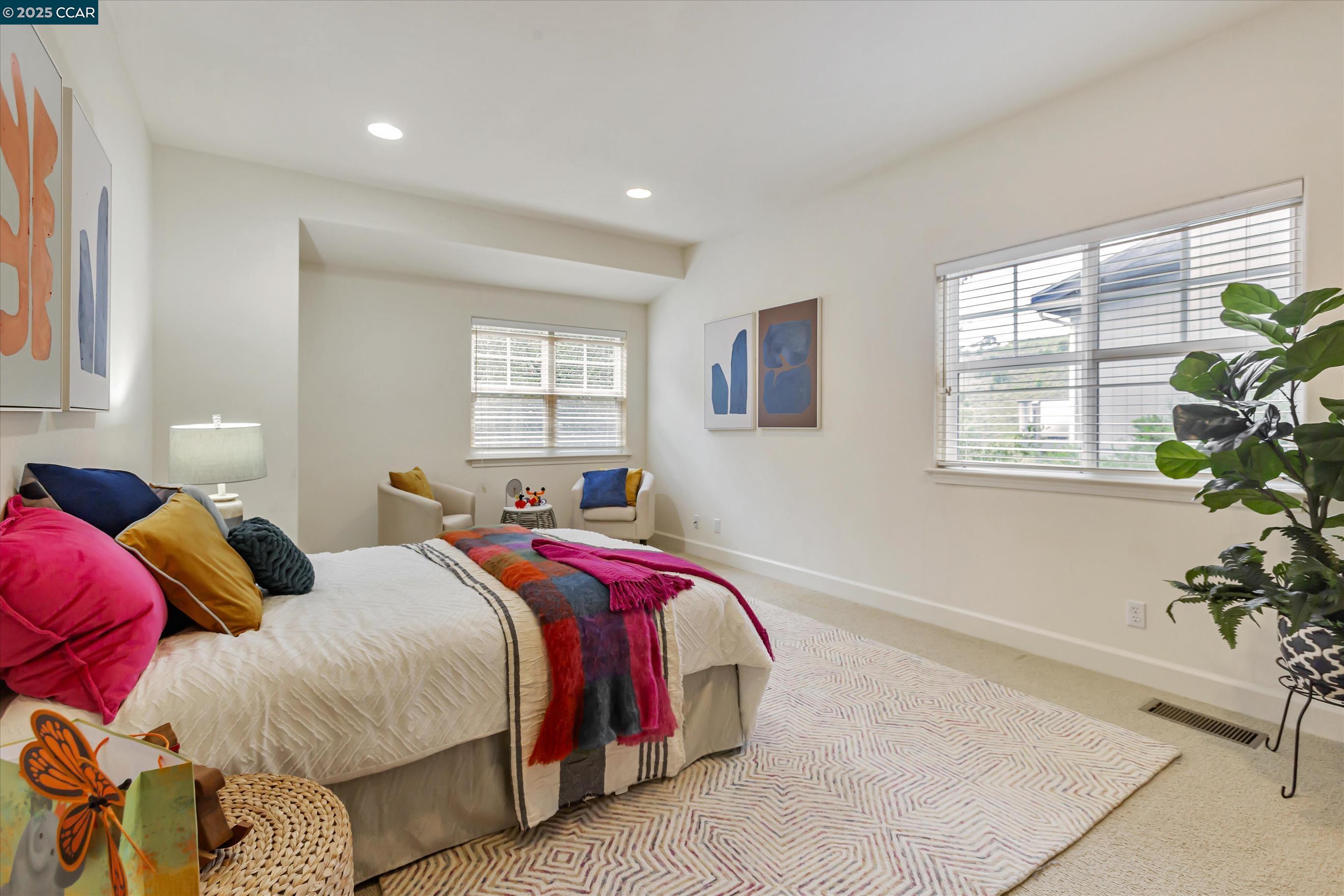 1215 Alvarado Road Berkeley, CA 94705 - Photo 24 of 52 a bedroom with two beds and a potted plant