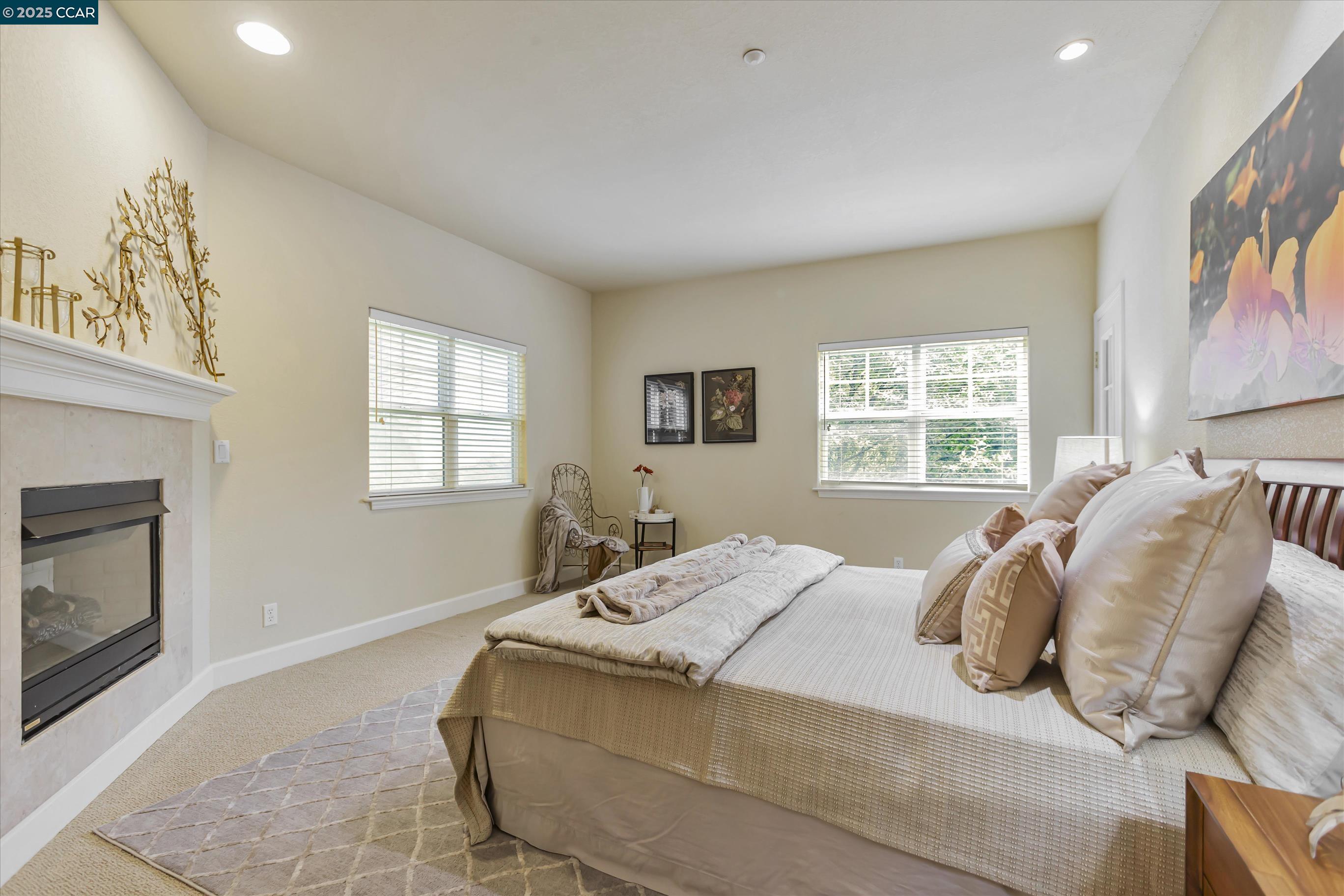 1215 Alvarado Road Berkeley, CA 94705 - Photo 26 of 52 a bed sitting in a bedroom next to a window
