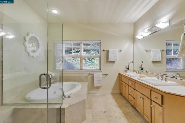 a utility room with sink dryer and washer