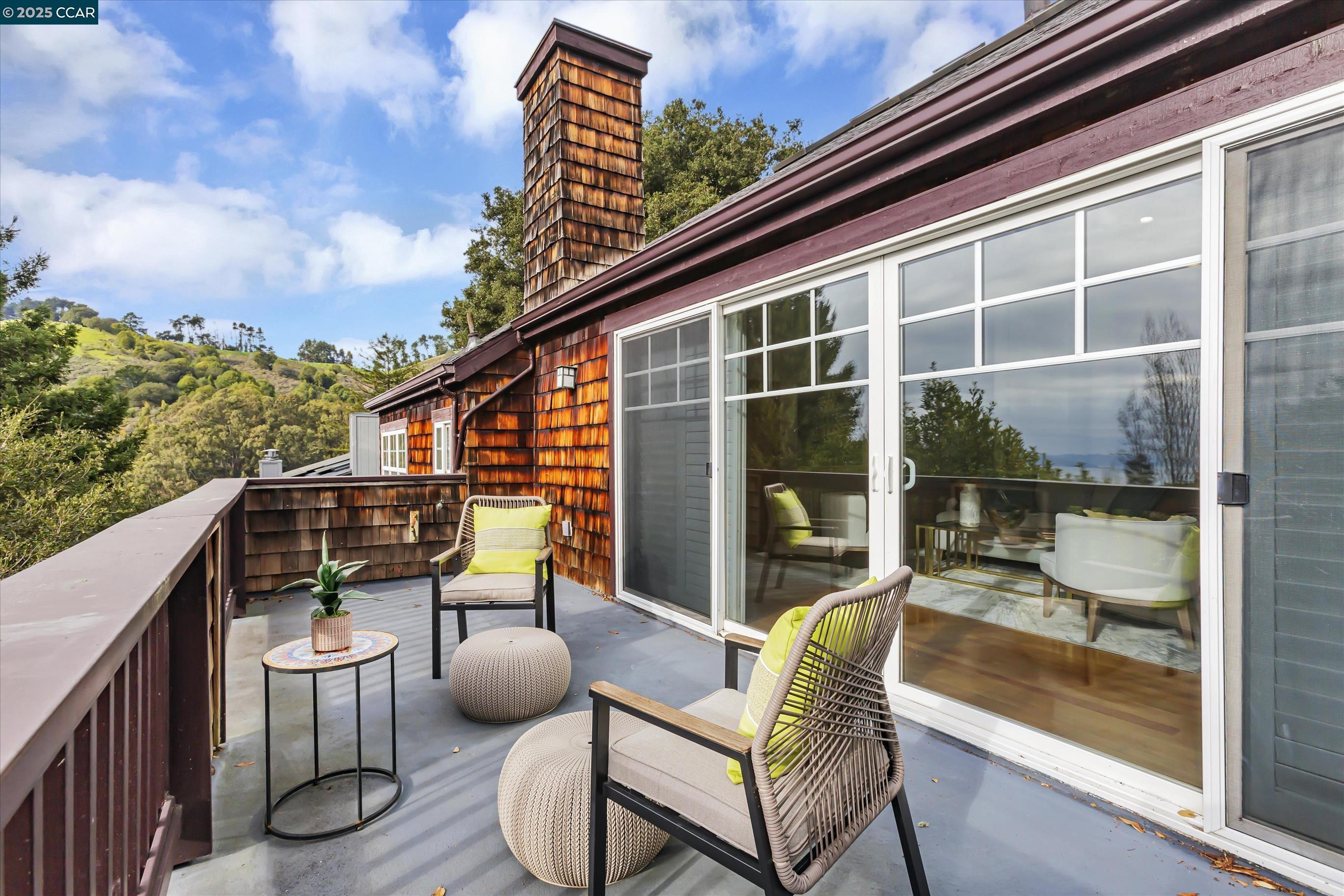 1215 Alvarado Road Berkeley, CA 94705 - Photo 44 of 52 a balcony with table and chairs