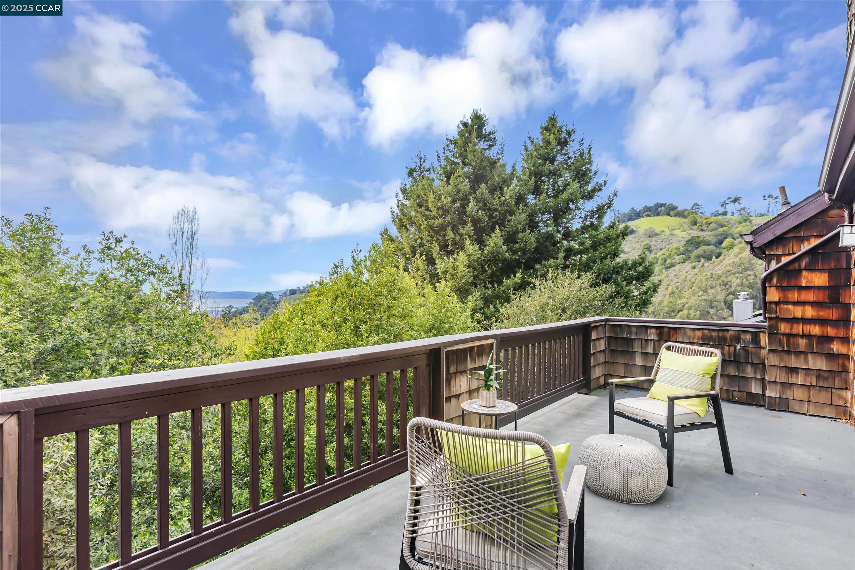 1215 Alvarado Road Berkeley, CA 94705 - Photo 45 of 52 a view of a chair and tables in the balcony