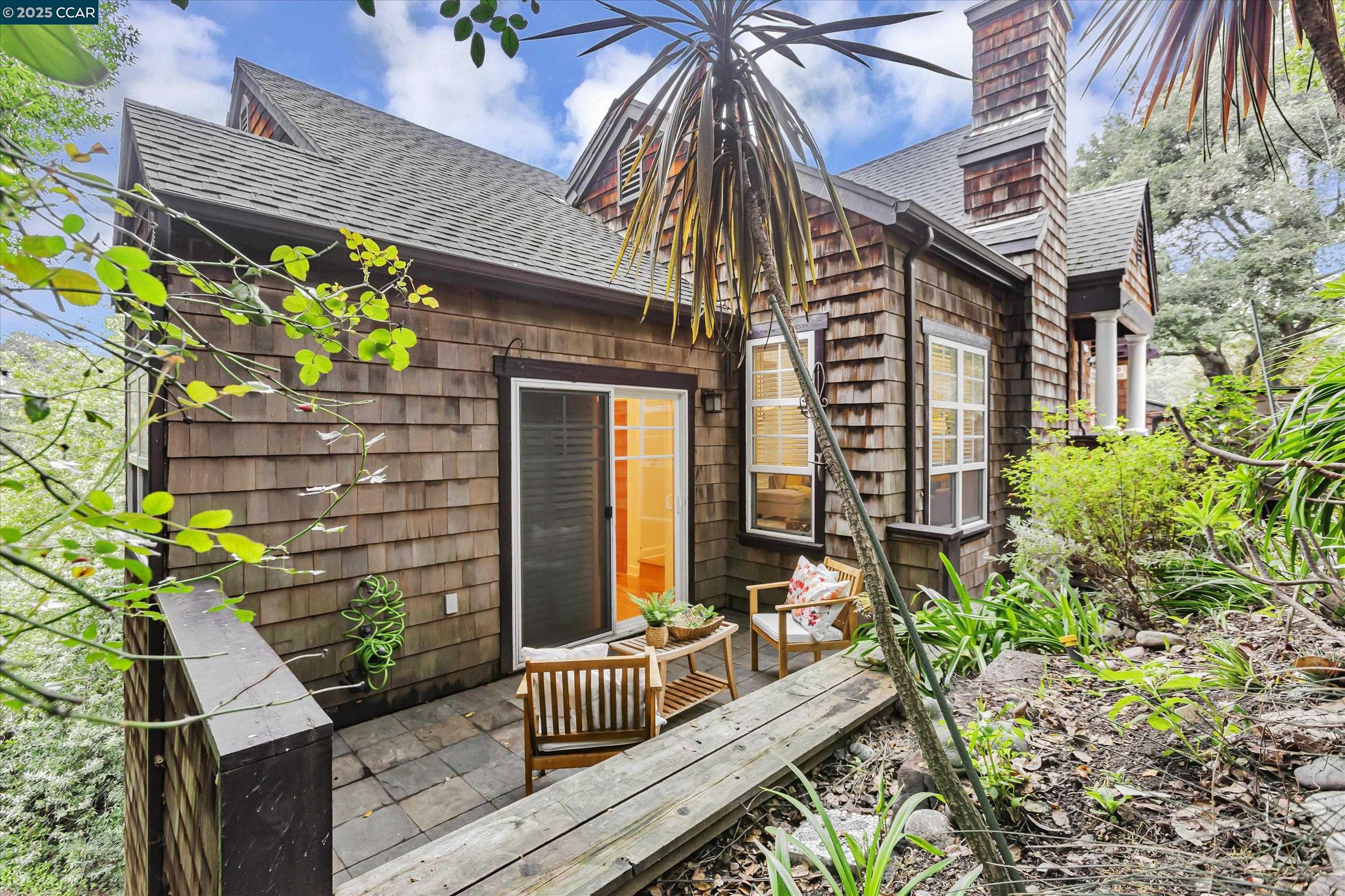 1215 Alvarado Road Berkeley, CA 94705 - Photo 49 of 52 a view of brick house with potted plants