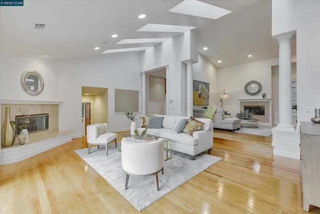 a living room with furniture and a rug