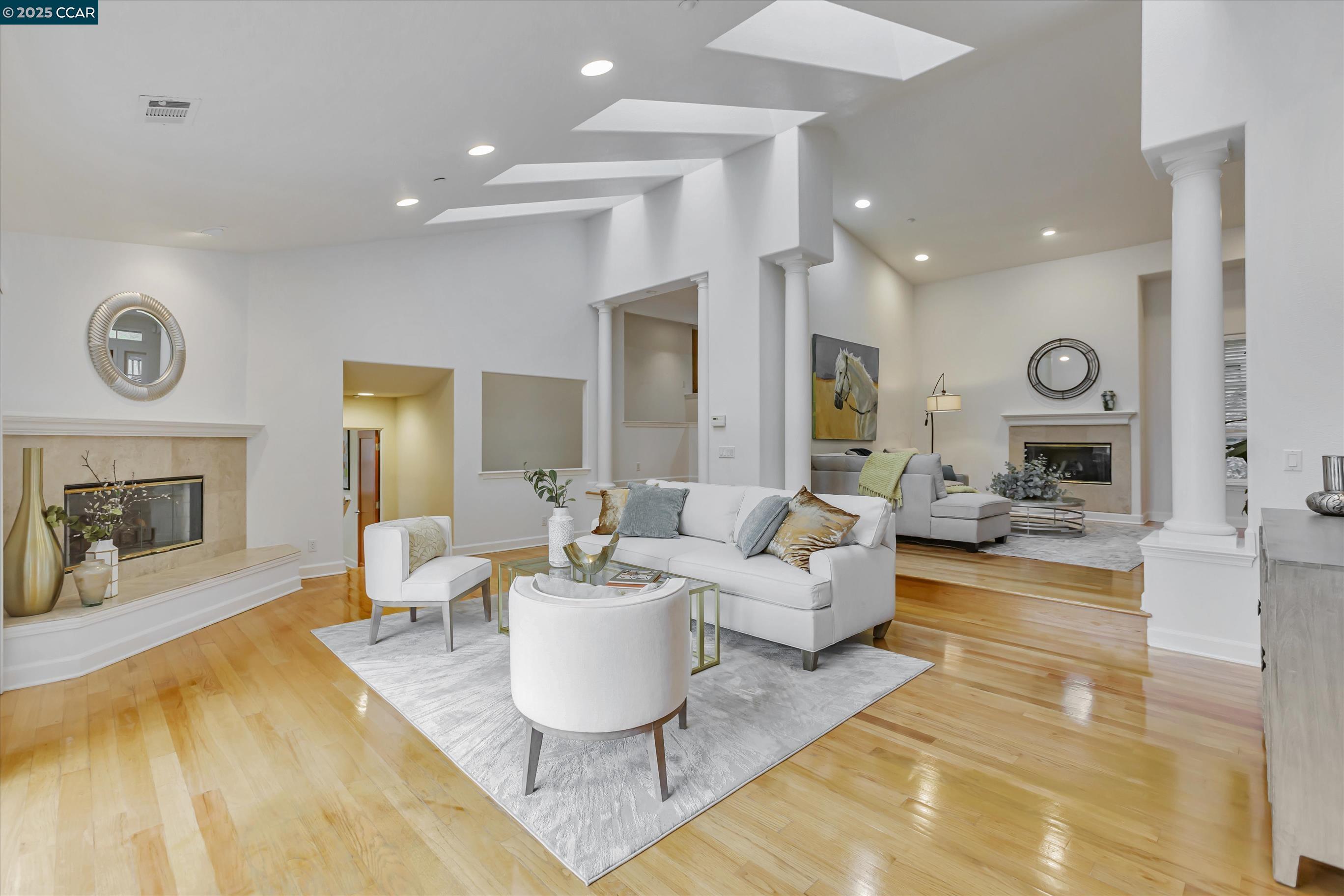 1215 Alvarado Road Berkeley, CA 94705 - Photo 9 of 52 a living room with fireplace furniture and a large window