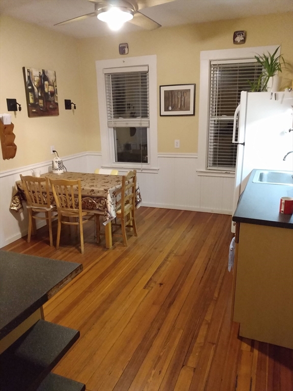 192 Federal Avenue, Unit B Quincy, MA 02169 - Photo 11 of 17 a dining room with furniture and wooden floor