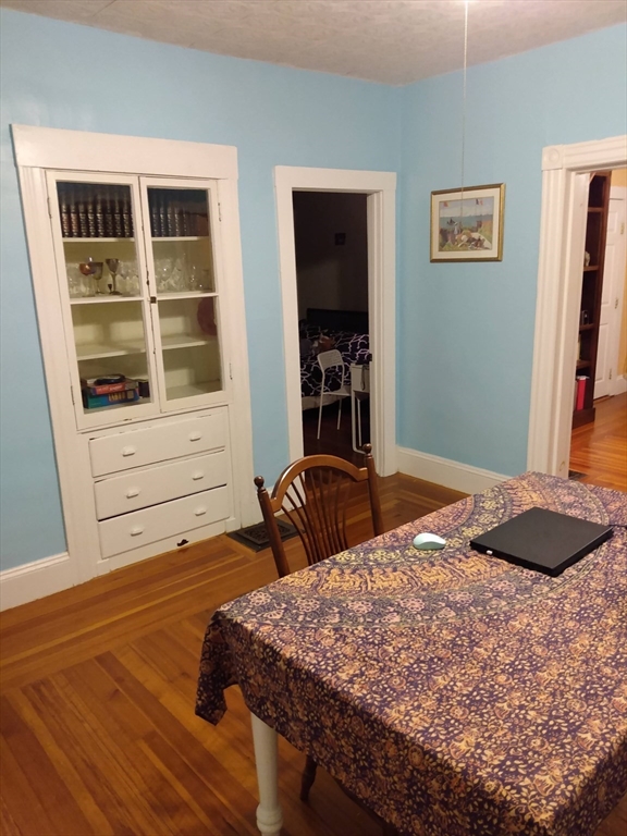 192 Federal Avenue, Unit B Quincy, MA 02169 - Photo 9 of 17 a bedroom with a bed and a window