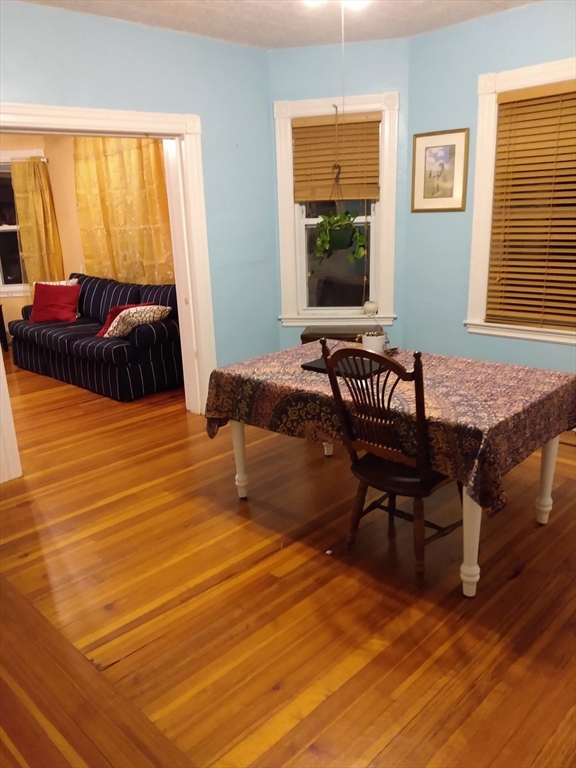 192 Federal Avenue, Unit B Quincy, MA 02169 - Photo 10 of 17 a bedroom with a bed and a window