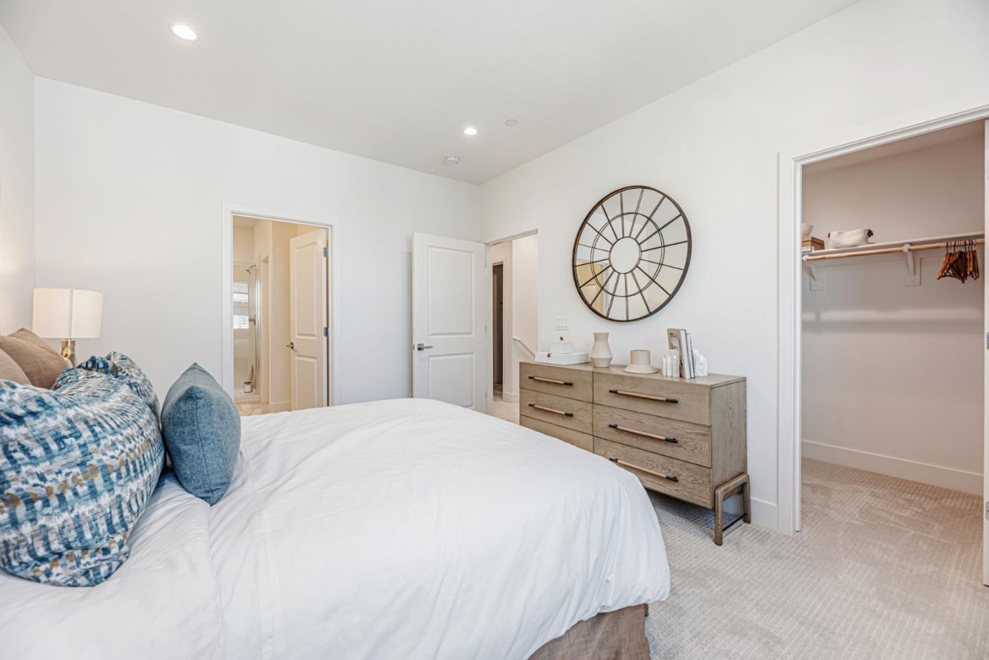 5005 Seashell Terrace San Ramon, CA 94583 - Photo 12 of 19 a bedroom with a bed and a chandelier