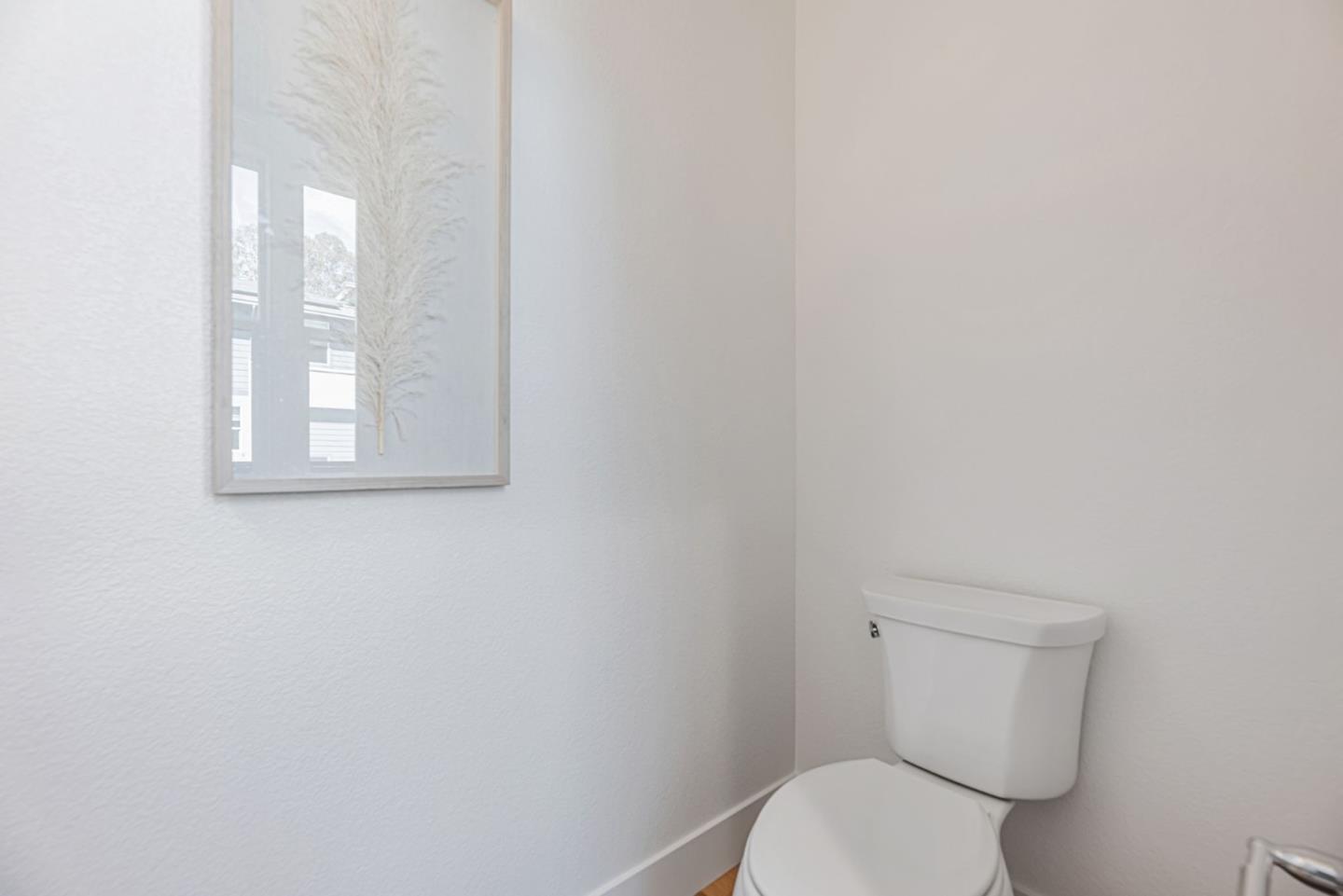 5005 Seashell Terrace San Ramon, CA 94583 - Photo 16 of 19 a white toilet sitting next to a white cabinet