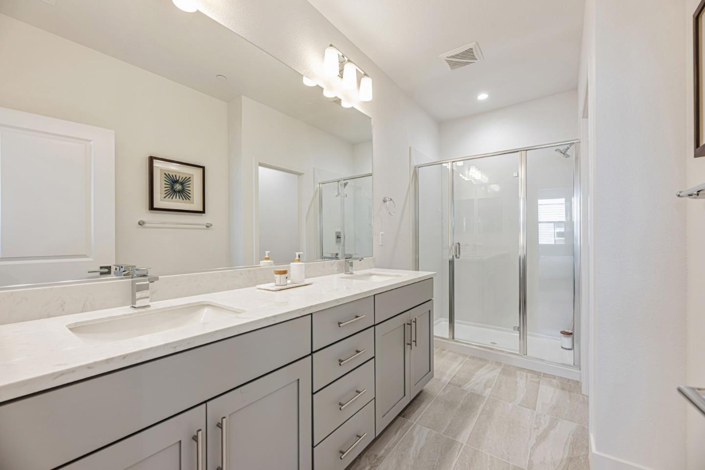5005 Seashell Terrace San Ramon, CA 94583 - Photo 18 of 19 a bathroom with a double vanity sink mirror and double