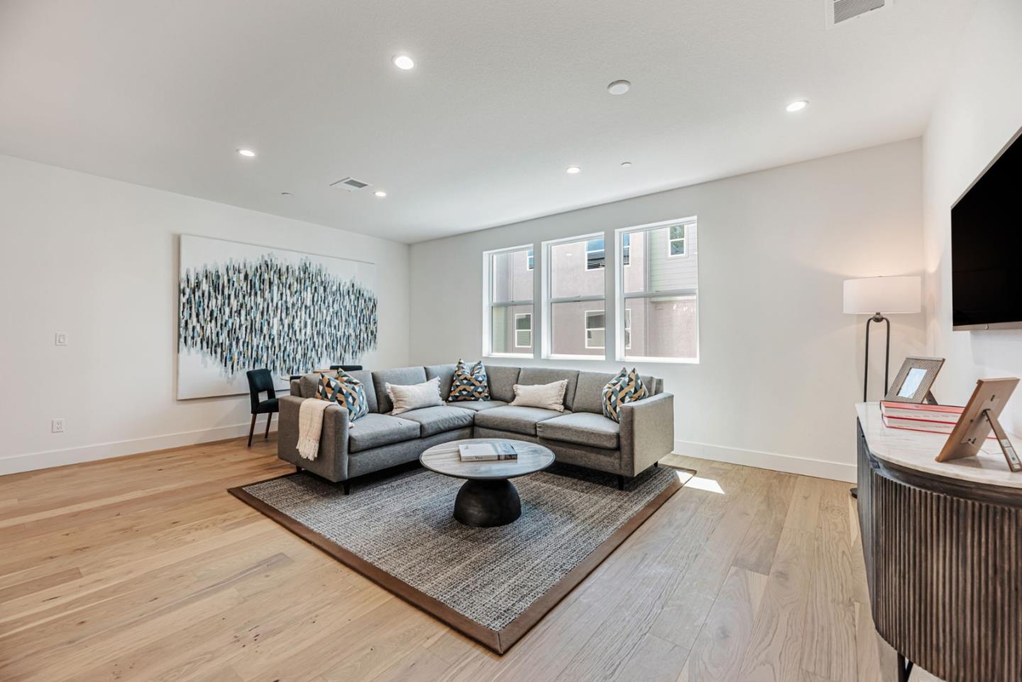 5005 Seashell Terrace San Ramon, CA 94583 - Photo 2 of 19 a living room with furniture and a flat screen tv