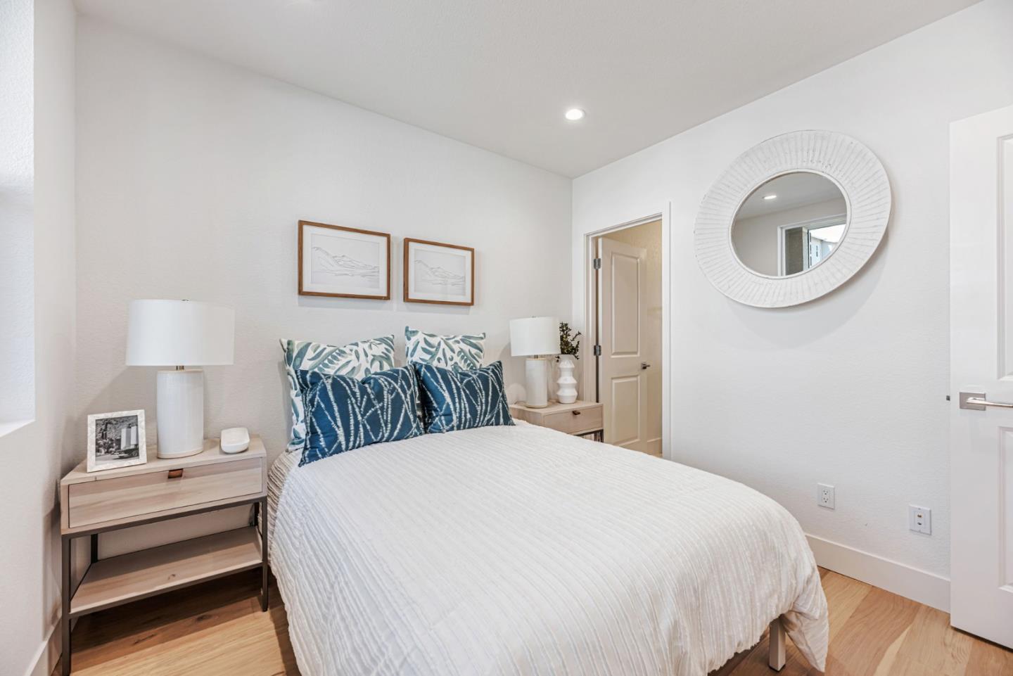 5005 Seashell Terrace San Ramon, CA 94583 - Photo 8 of 19 a bedroom with a bed and a lamp