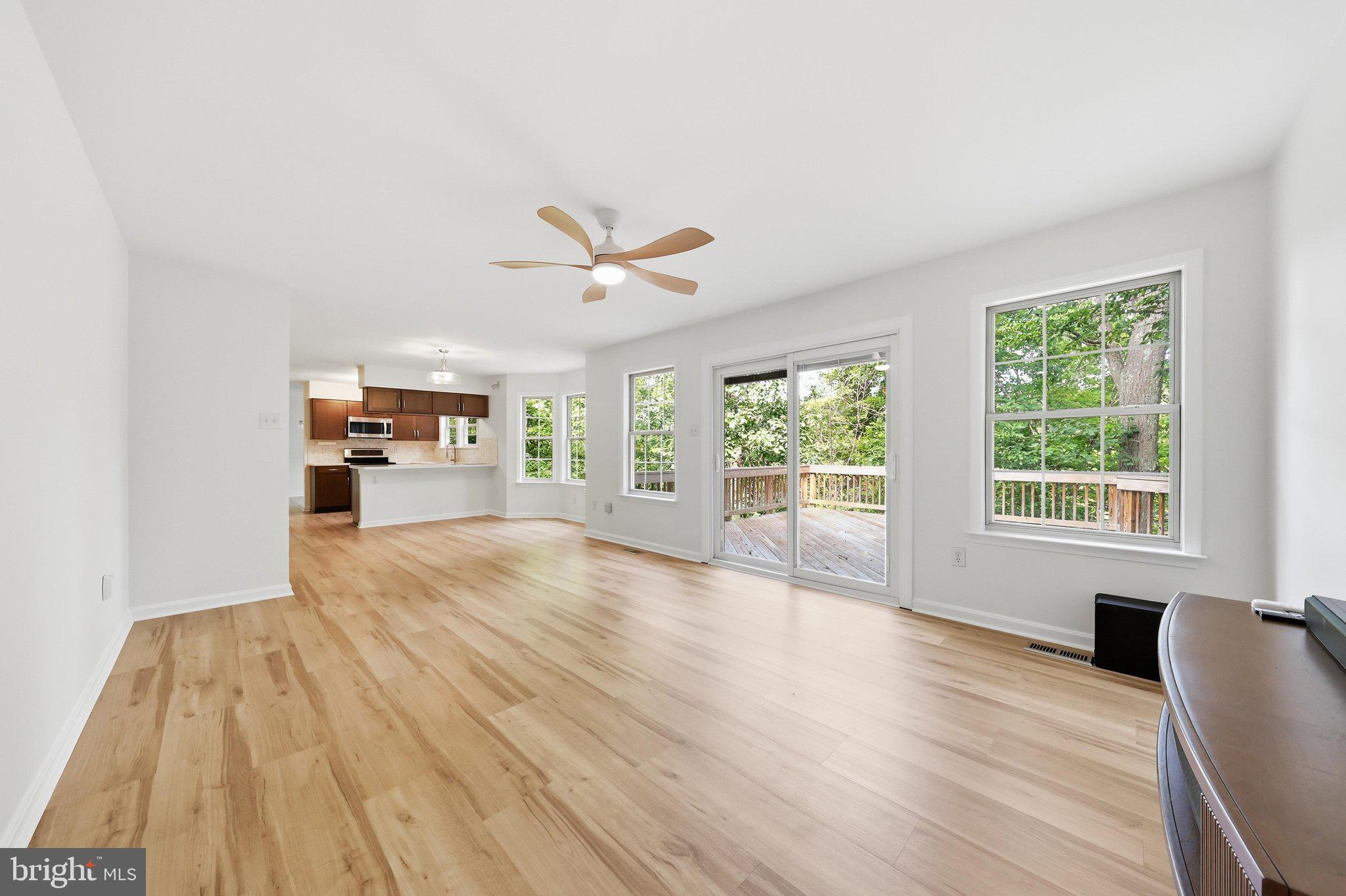 6728 Oakridge Road New Market, MD 21774 - Photo 19 of 75 Family Room & Kitchen
