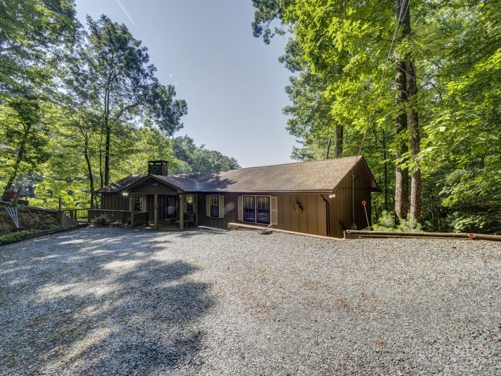 265 Trout Lake Road Deep Gap, NC 28618 - Photo 8 of 50 front view of a house with a trees