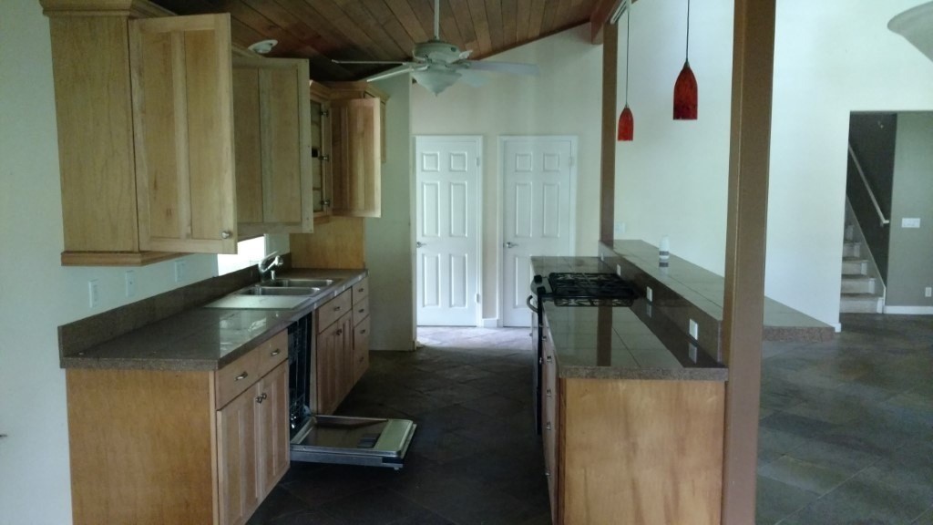 6011 Olohena Road, Unit 1 Kapaa, HI 96746 - Photo 14 of 24 a utility room with two washing machine