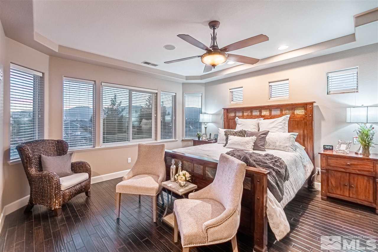 2610 Fury Court Reno, NV 89521 - Photo 15 of 25 a bedroom with a bed and a large window